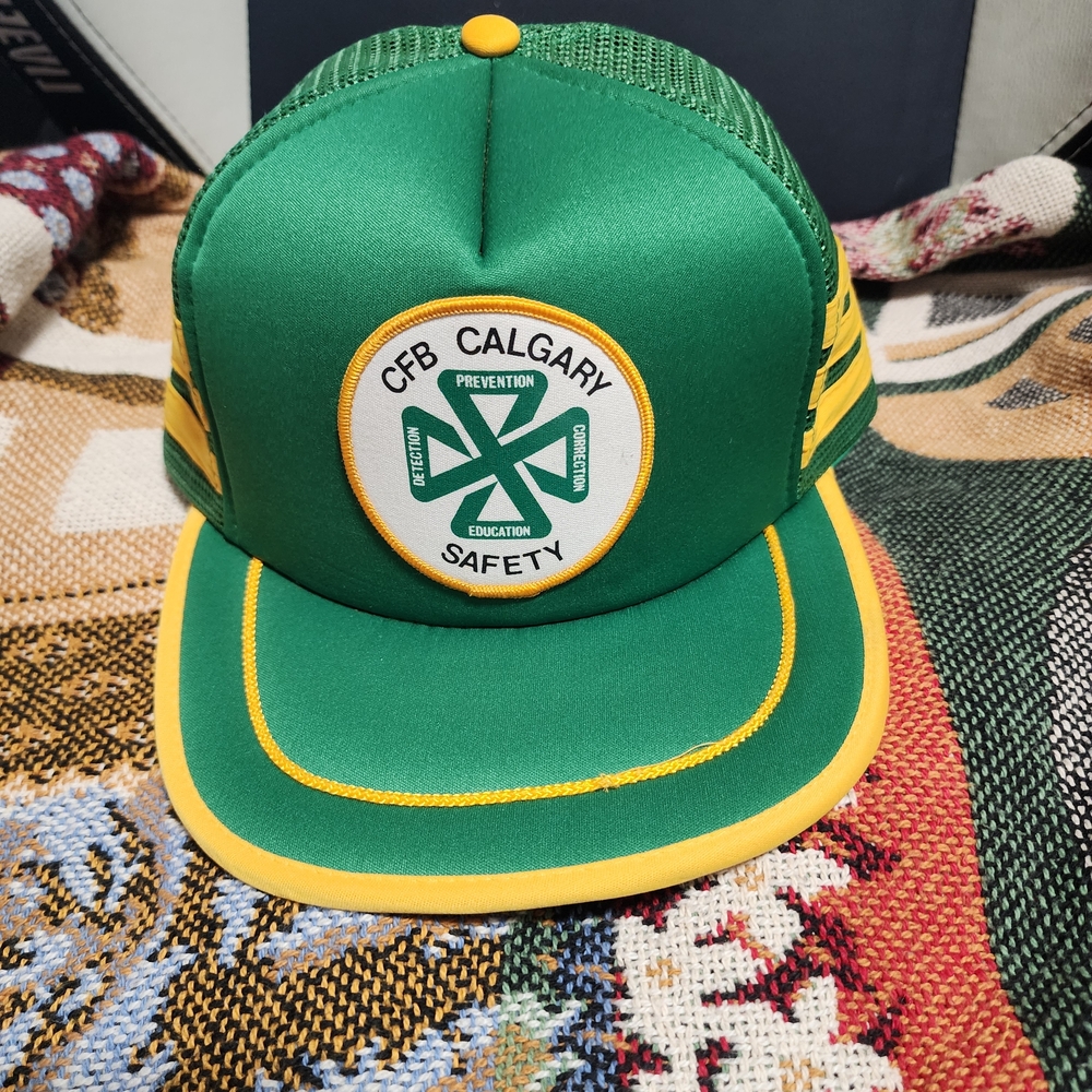 Green and Yellow Safety Cap